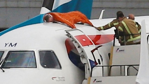 
                              Extinction Rebellion protester climbs on plane at London City Airport
                      