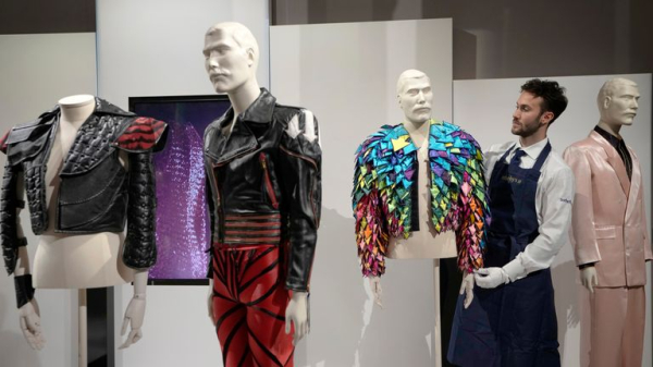 Freddie Mercury's handwritten drafts for Queen's Bohemian Rhapsody sell for £1.3m